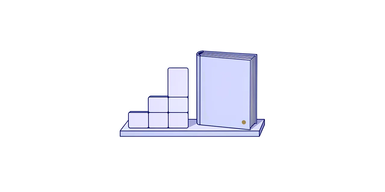 a few blocks stepped like a short staircase on a flat base, beside a closed book